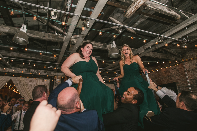 A fun and candid wedding reception at Mt Washington Mill Dye House in Baltimore, Maryland. Captured by Britney Clause Photography