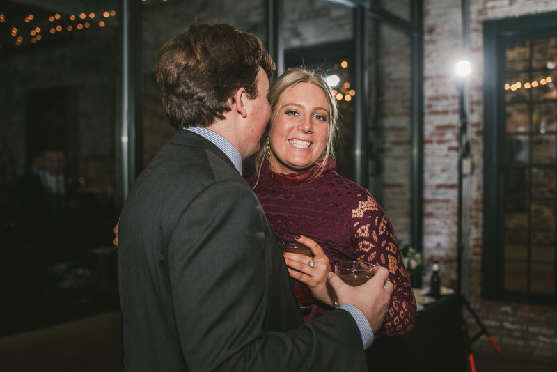 A fun and candid wedding reception at Mt Washington Mill Dye House in Baltimore, Maryland. Captured by Britney Clause Photography