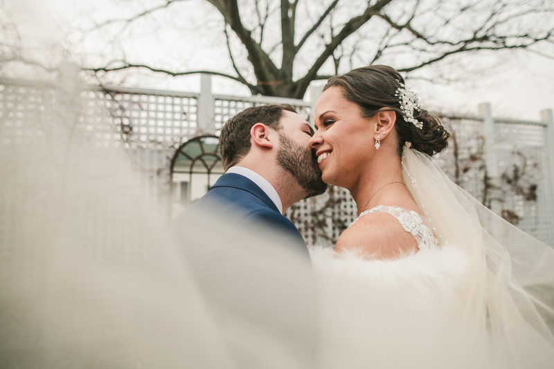 Gorgeous wedding portraits of the bride and groom at Kurtz's Beach in Pasadena, Maryland by Britney Clause Photography