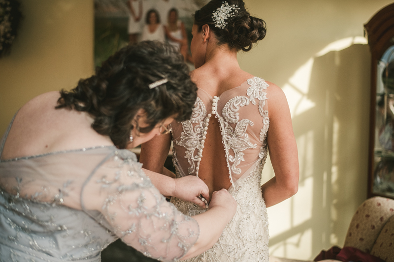 A bride getting ready for her wedding in Pasadena, Maryland by Britney Clause Photography