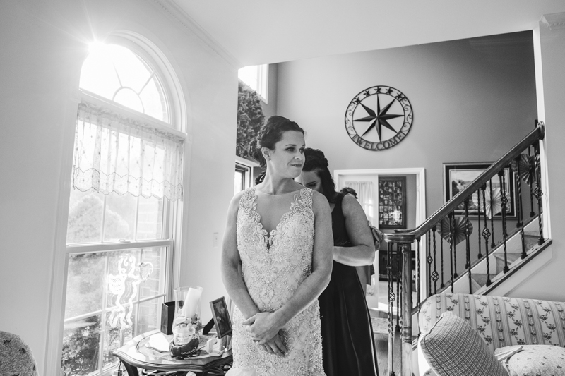 A bride getting ready for her wedding in Pasadena, Maryland by Britney Clause Photography