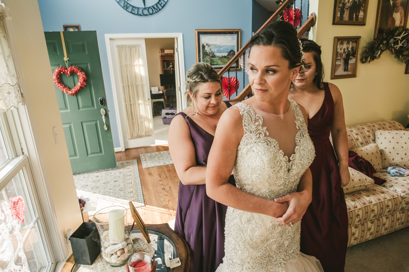 A bride getting ready for her wedding in Pasadena, Maryland by Britney Clause Photography