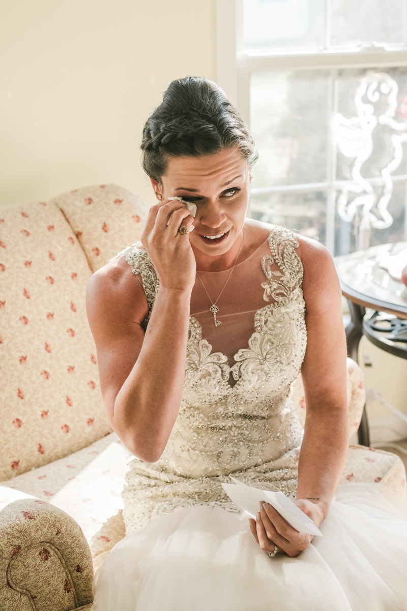 A bride getting ready for her wedding in Pasadena, Maryland by Britney Clause Photography