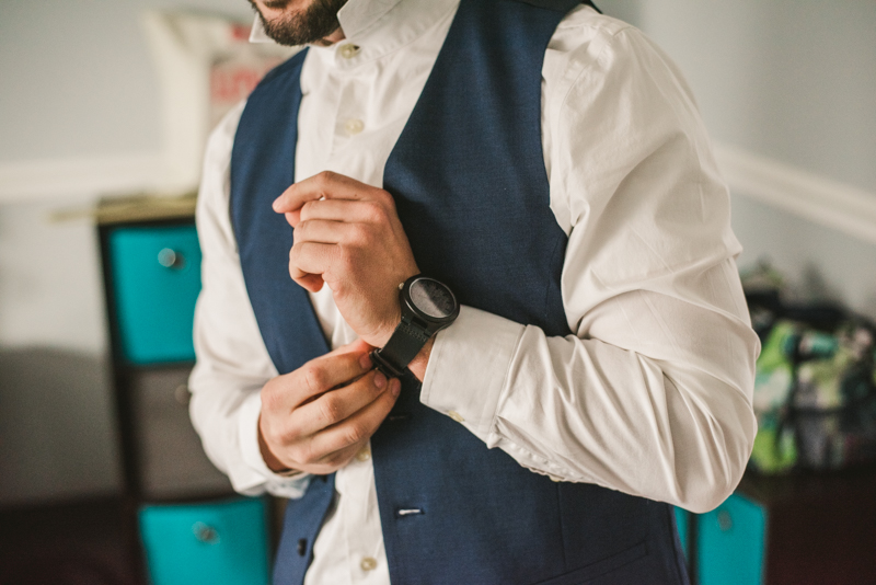 A groom getting ready for his wedding in Pasadena, Maryland by Britney Clause Photography