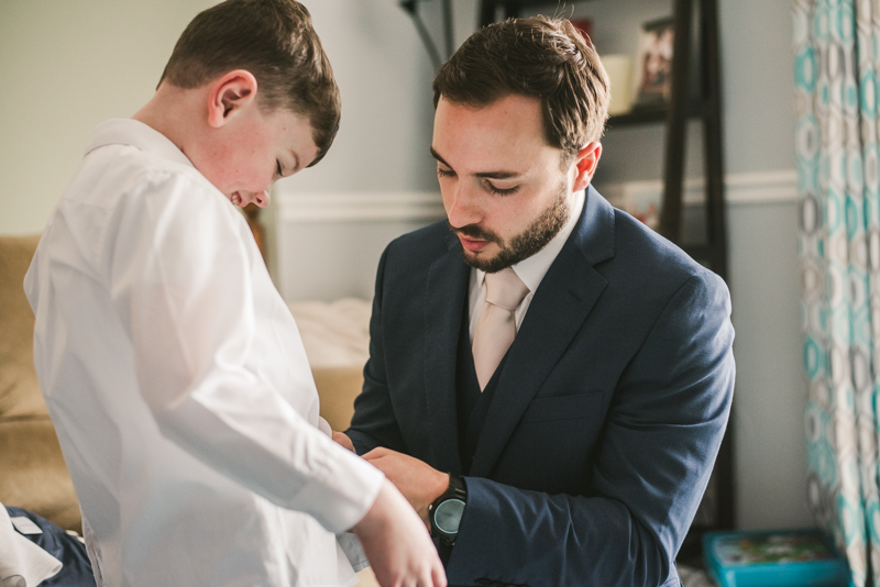 A groom getting ready for his wedding in Pasadena, Maryland by Britney Clause Photography