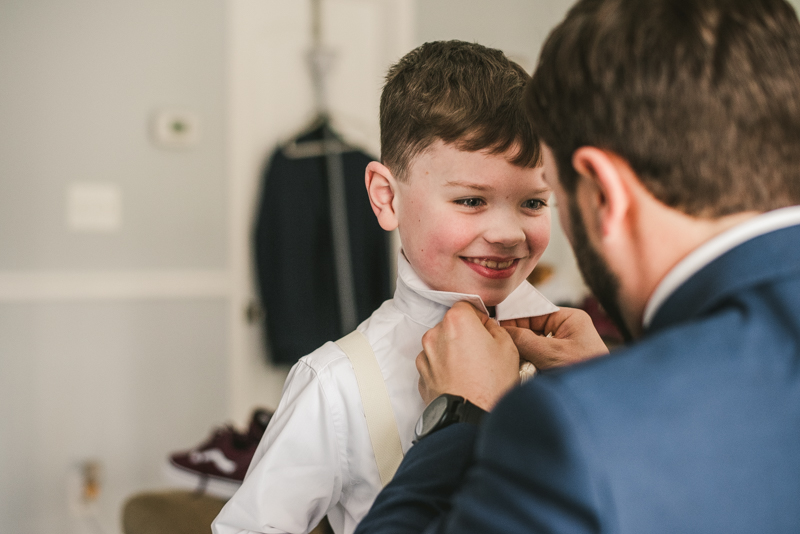 A groom getting ready for his wedding in Pasadena, Maryland by Britney Clause Photography