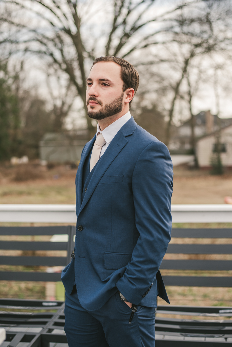 A groom getting ready for his wedding in Pasadena, Maryland by Britney Clause Photography