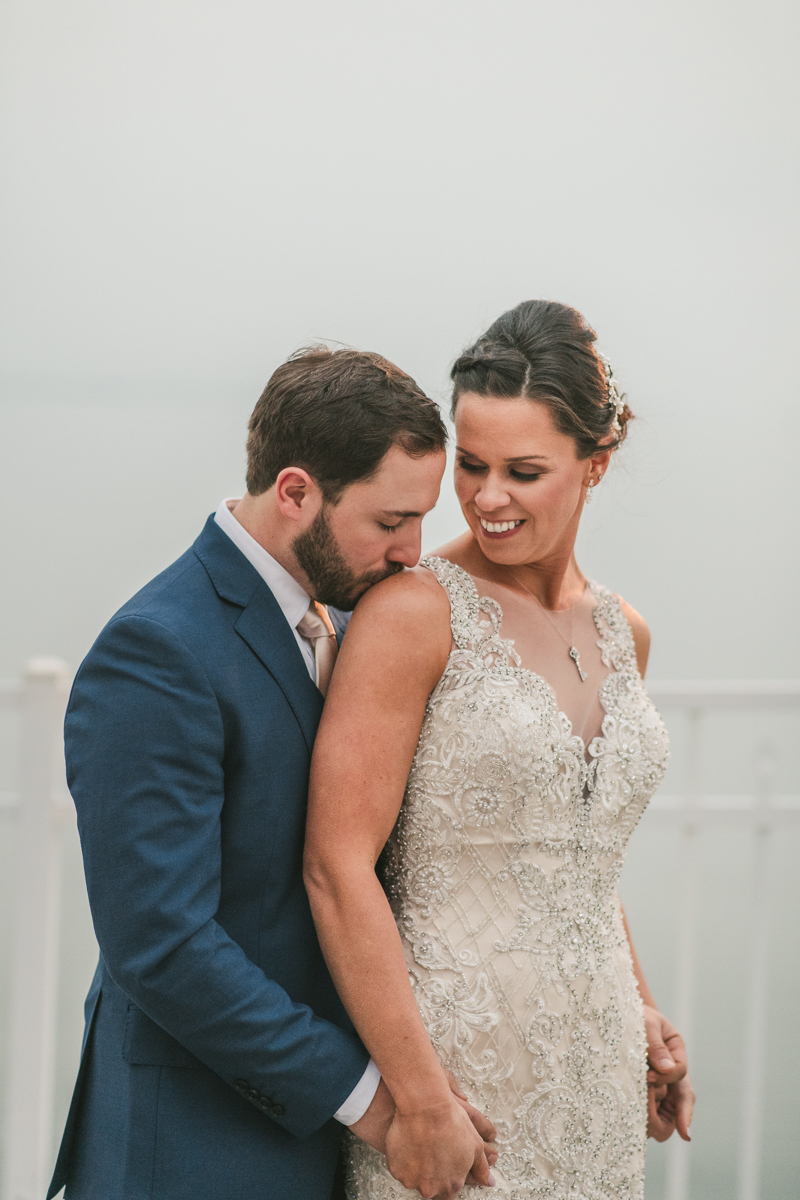 Gorgeous wedding portraits of the bride and groom at Kurtz's Beach in Pasadena, Maryland by Britney Clause Photography