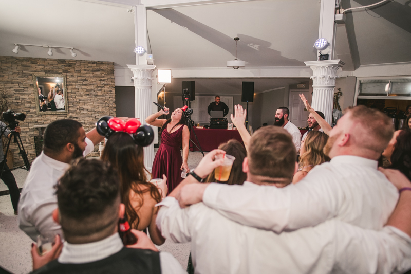 A fun and magical wedding reception at Kurtz's Beach in Pasadena, Maryland by Britney Clause Photography