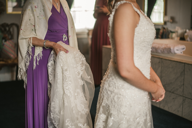 A bride getting ready for her wedding in Taneytown, Maryland by Britney Clause Photography