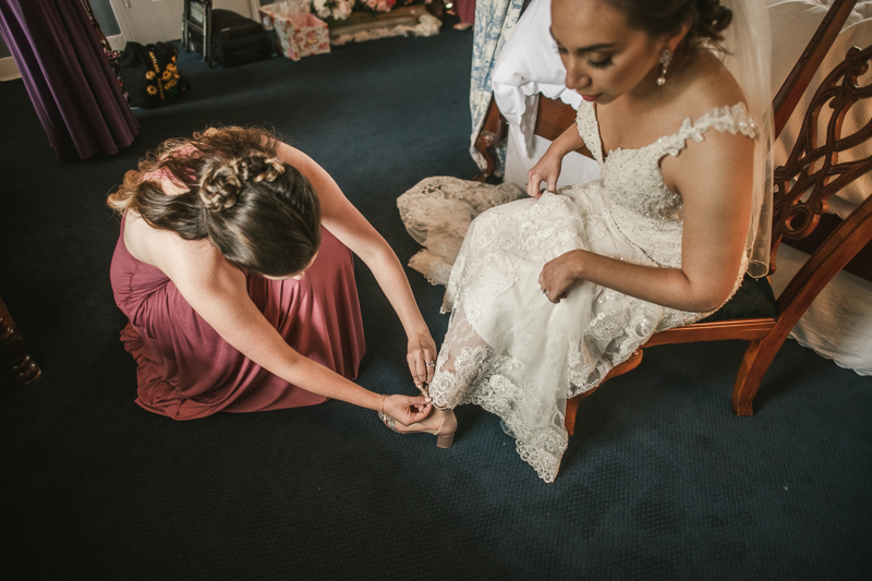 A bride getting ready for her wedding in Taneytown, Maryland by Britney Clause Photography