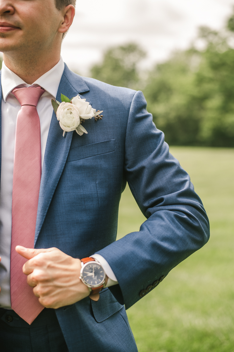 A groom getting ready for his wedding in Taneytown,, Maryland by Britney Clause Photography