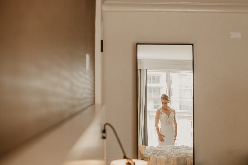 A bride getting ready for her wedding in Baltimore, Maryland by Britney Clause Photography