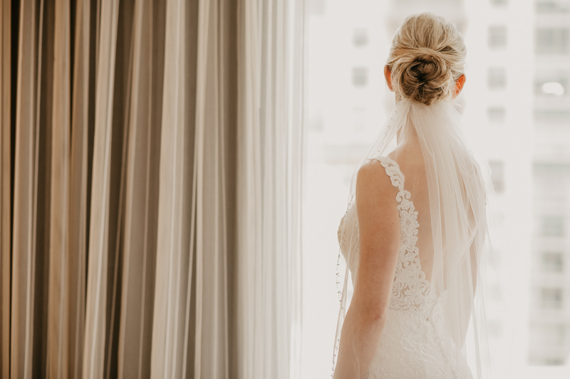 A bride getting ready for her wedding in Baltimore, Maryland by Britney Clause Photography