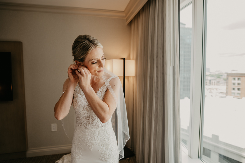 A bride getting ready for her wedding in Baltimore, Maryland by Britney Clause Photography