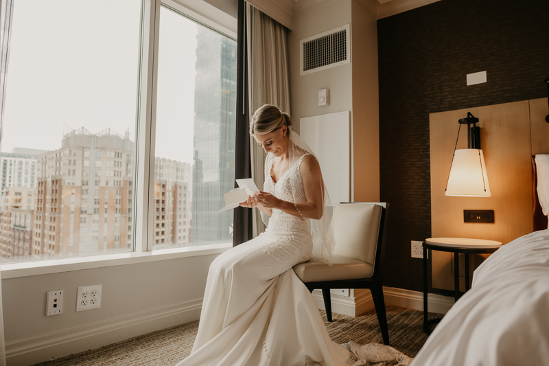 A bride getting ready for her wedding in Baltimore, Maryland by Britney Clause Photography
