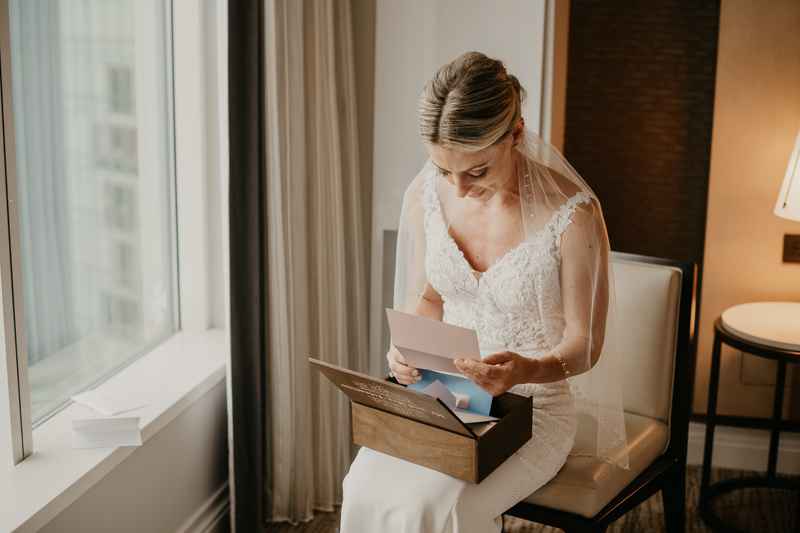 A bride getting ready for her wedding in Baltimore, Maryland by Britney Clause Photography