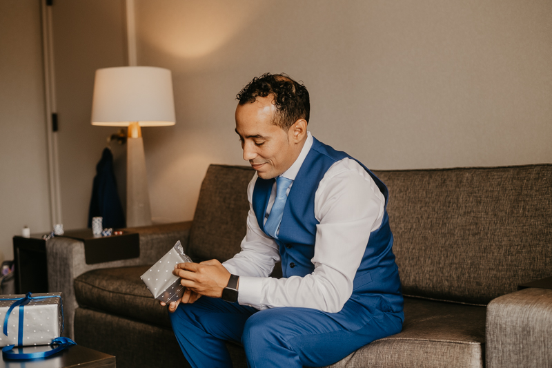 A groom getting ready for his wedding in Baltimore, Maryland by Britney Clause Photography