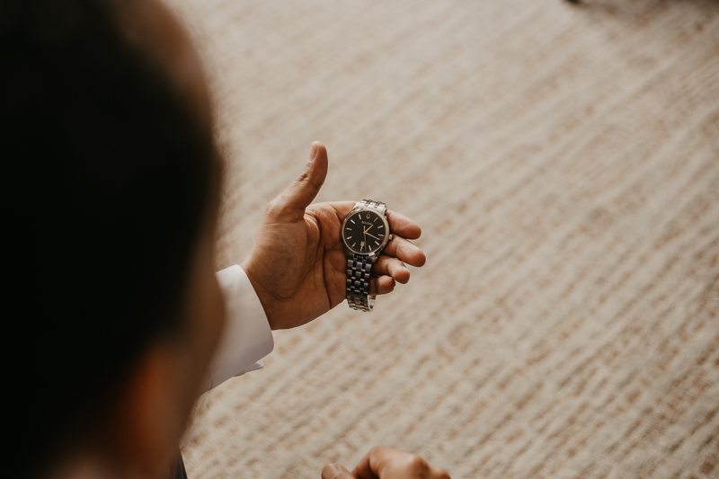 A groom getting ready for his wedding in Baltimore, Maryland by Britney Clause Photography