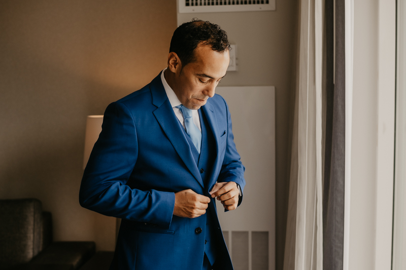 A groom getting ready for his wedding in Baltimore, Maryland by Britney Clause Photography