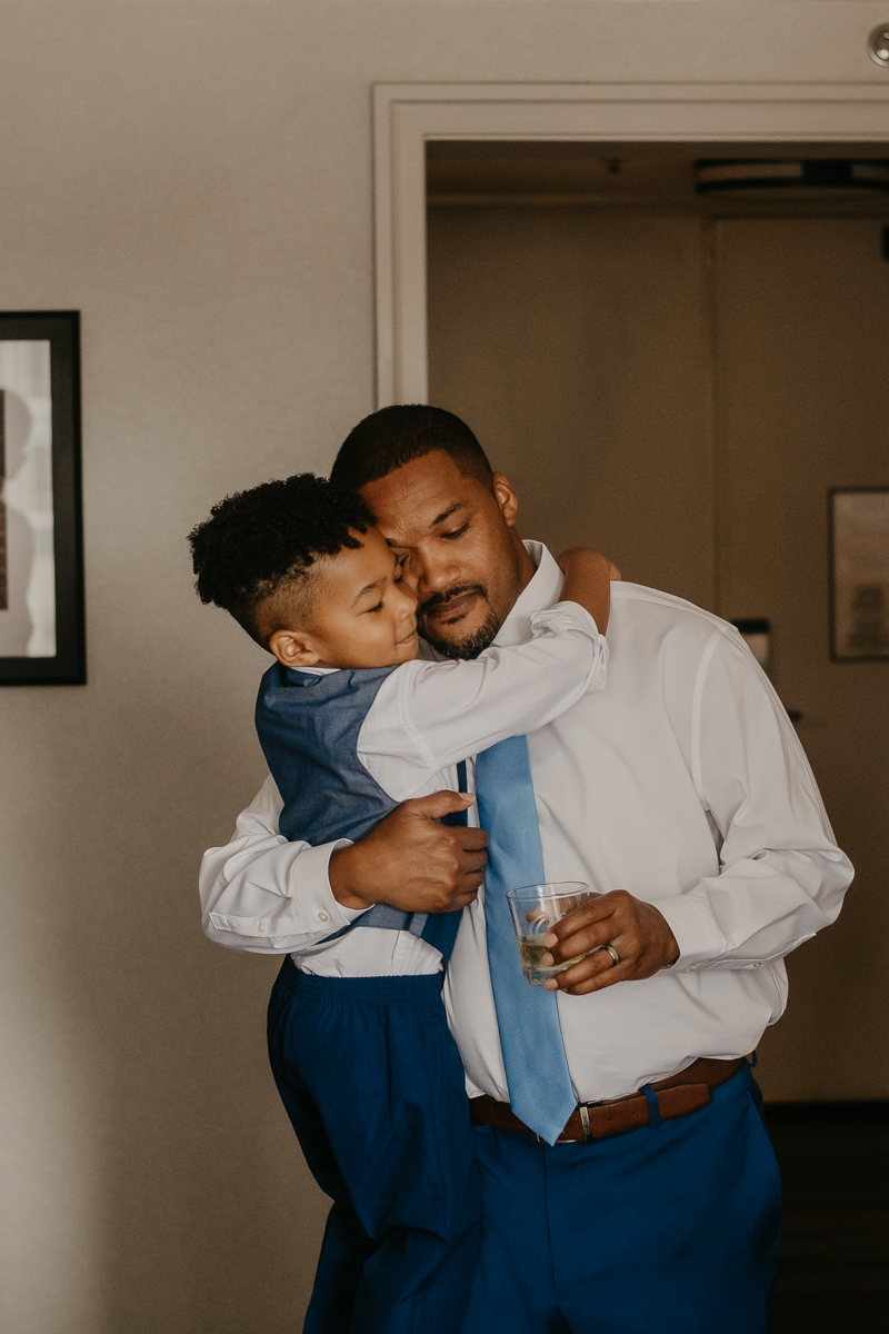 A groom getting ready for his wedding in Baltimore, Maryland by Britney Clause Photography