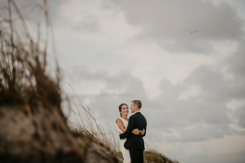 Stunning bride and groom beach wedding portraits in Folly Beach, South Carolina by Britney Clause Photography