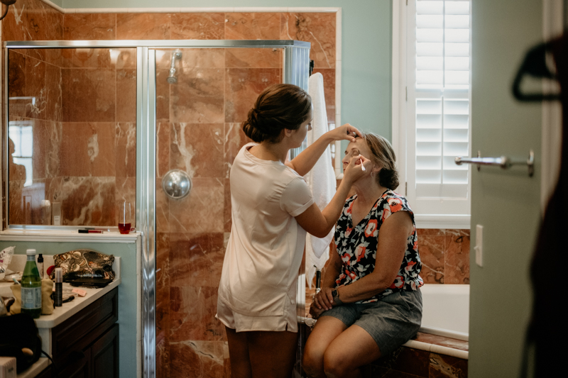 A summer beach wedding in July at in Folly Beach, South Carolina by Britney Clause Photography