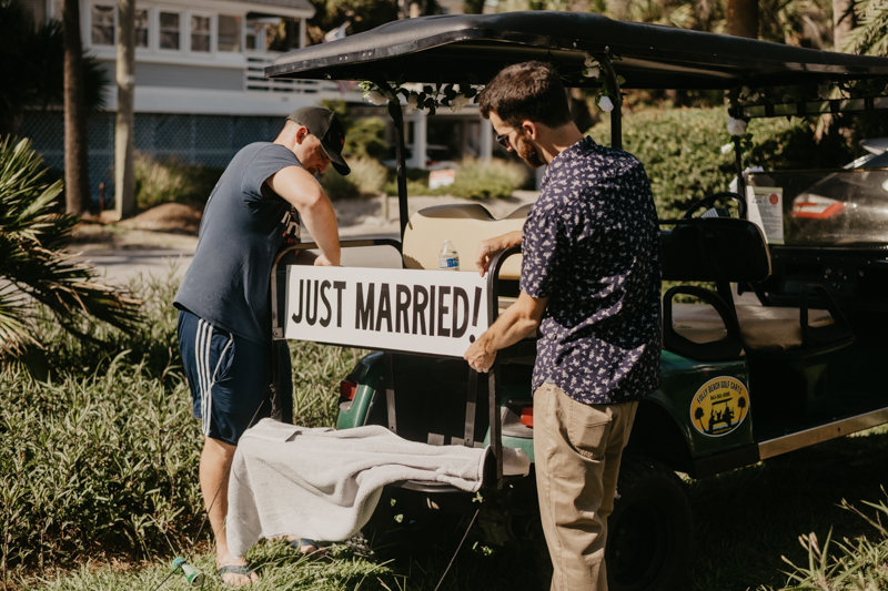 A summer beach wedding in July at in Folly Beach, South Carolina by Britney Clause Photography