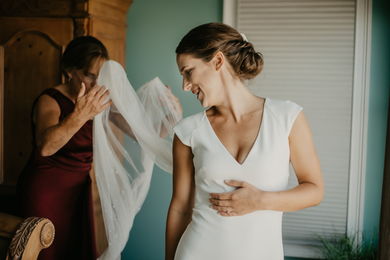 A bride getting ready for her wedding in Folly Beach, South Carolina by Britney Clause Photography