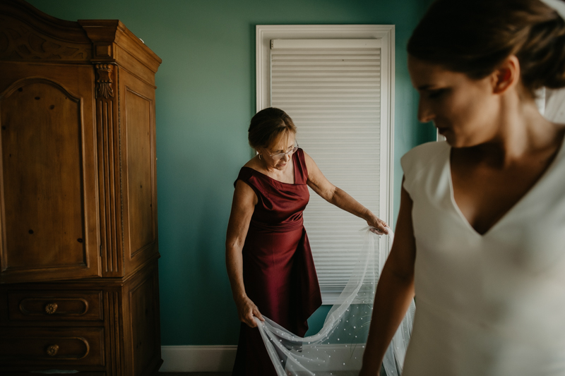 A bride getting ready for her wedding in Folly Beach, South Carolina by Britney Clause Photography