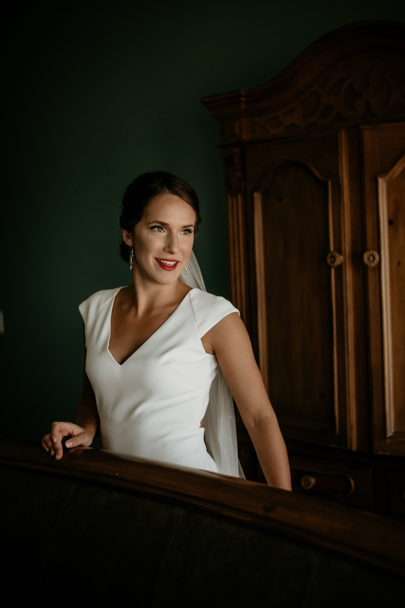 A bride getting ready for her wedding in Folly Beach, South Carolina by Britney Clause Photography