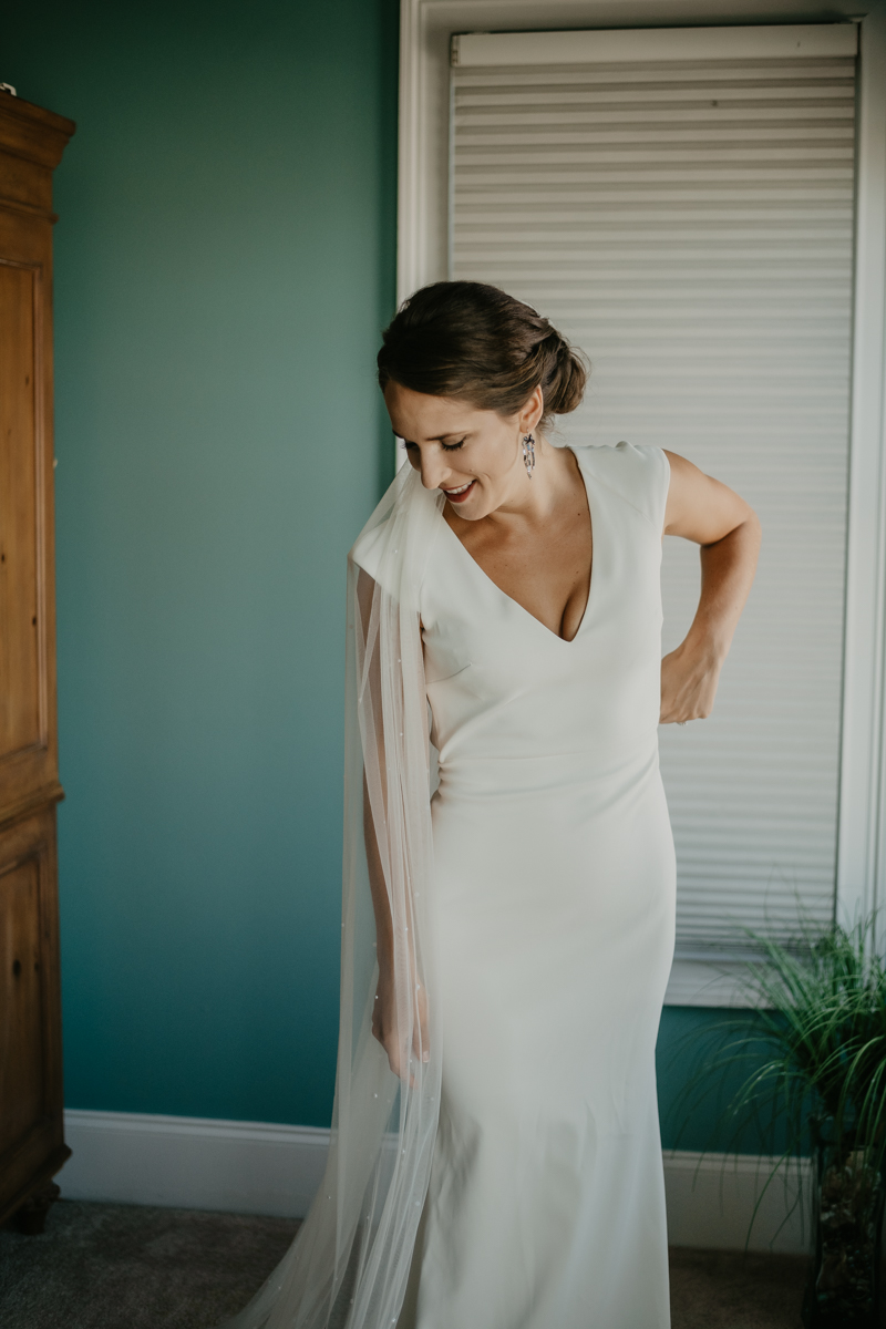 A bride getting ready for her wedding in Folly Beach, South Carolina by Britney Clause Photography