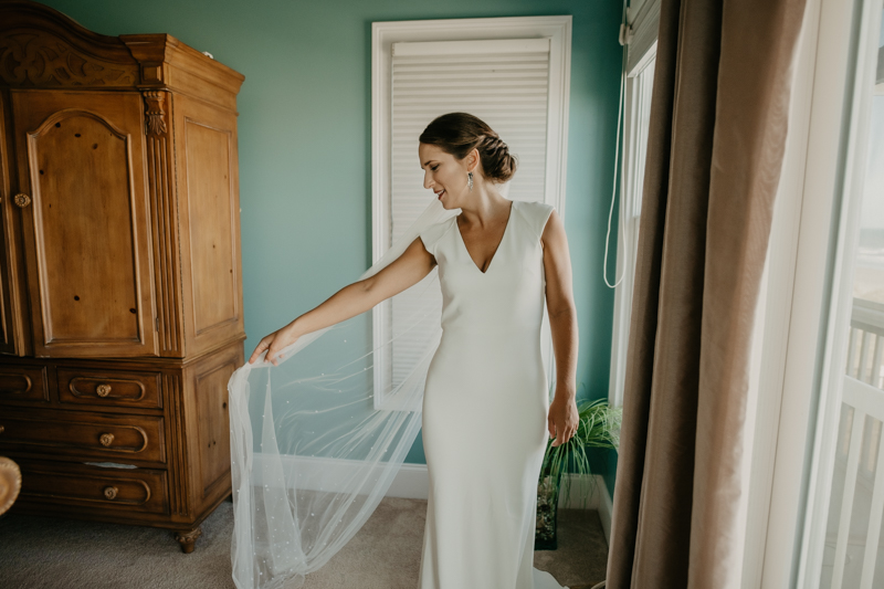 A bride getting ready for her wedding in Folly Beach, South Carolina by Britney Clause Photography