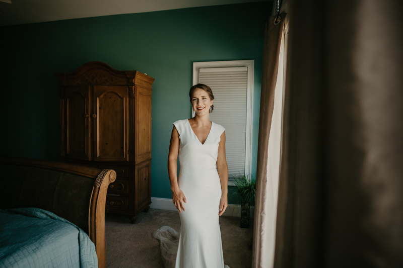 A bride getting ready for her wedding in Folly Beach, South Carolina by Britney Clause Photography