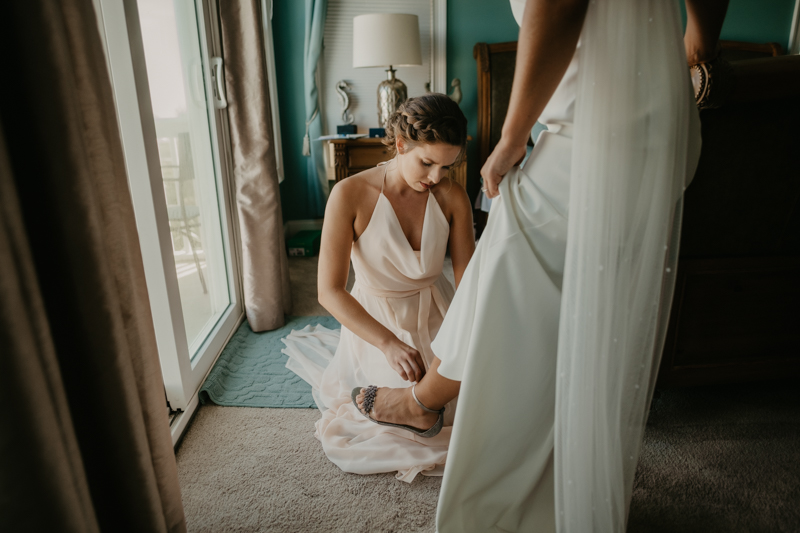 A bride getting ready for her wedding in Folly Beach, South Carolina by Britney Clause Photography