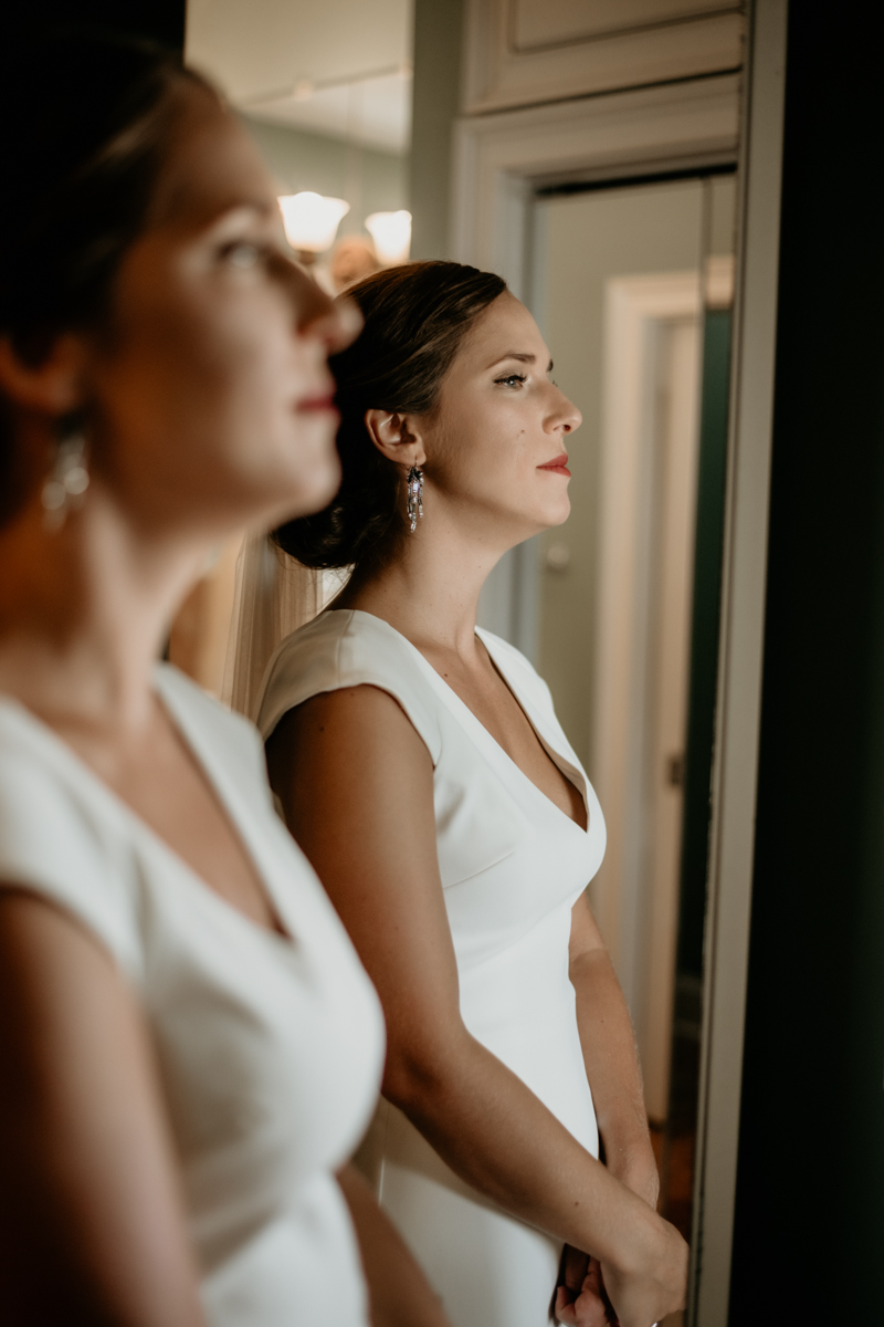 A bride getting ready for her wedding in Folly Beach, South Carolina by Britney Clause Photography