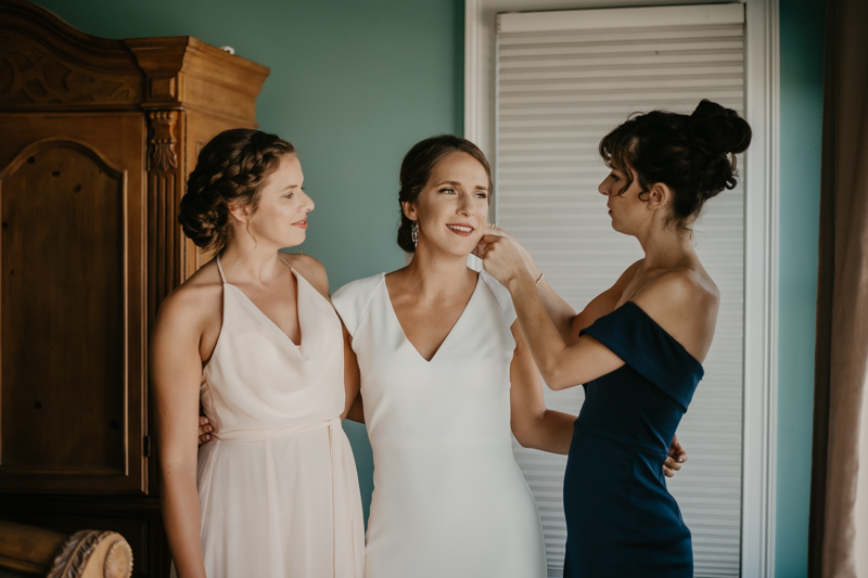 A bride getting ready for her wedding in Folly Beach, South Carolina by Britney Clause Photography