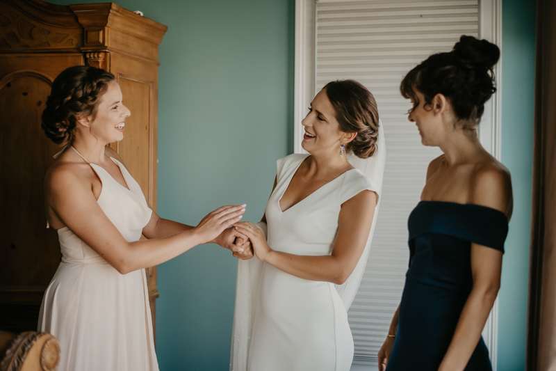 A bride getting ready for her wedding in Folly Beach, South Carolina by Britney Clause Photography