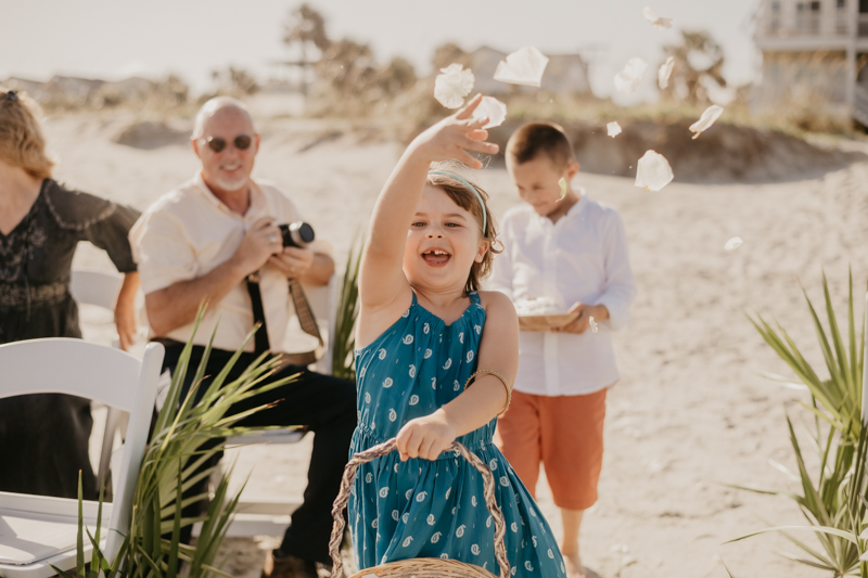 A beautiful beach wedding ceremony in Folly Beach, South Carolina by Britney Clause Photography