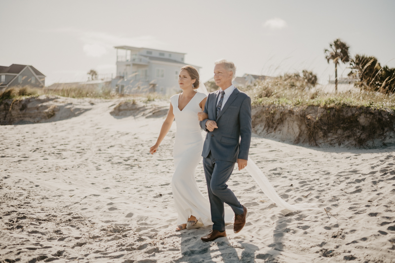 A beautiful beach wedding ceremony in Folly Beach, South Carolina by Britney Clause Photography