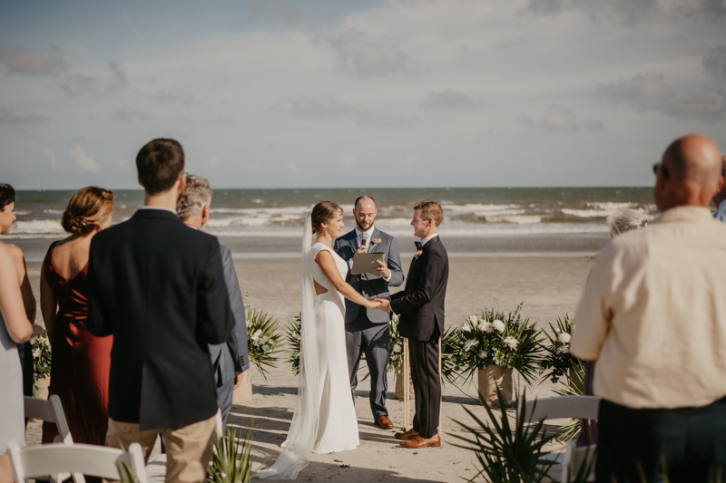 A beautiful beach wedding ceremony in Folly Beach, South Carolina by Britney Clause Photography