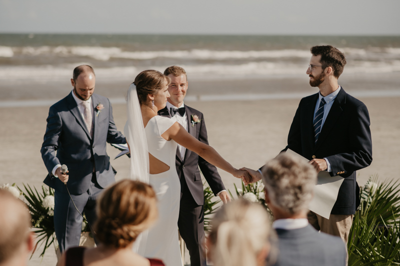 A beautiful beach wedding ceremony in Folly Beach, South Carolina by Britney Clause Photography
