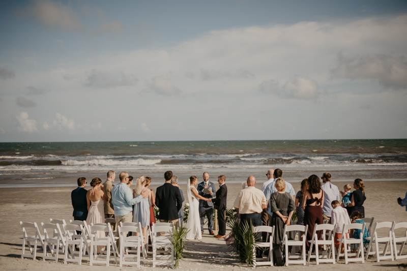 A beautiful beach wedding ceremony in Folly Beach, South Carolina by Britney Clause Photography