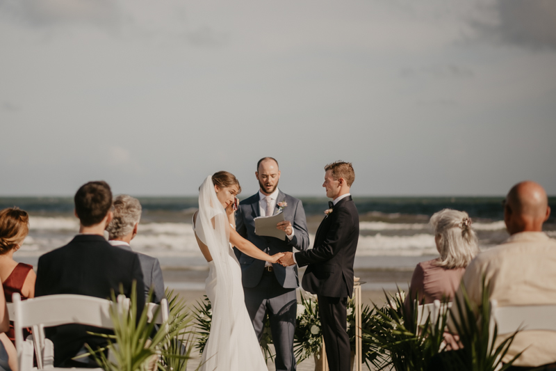 A beautiful beach wedding ceremony in Folly Beach, South Carolina by Britney Clause Photography