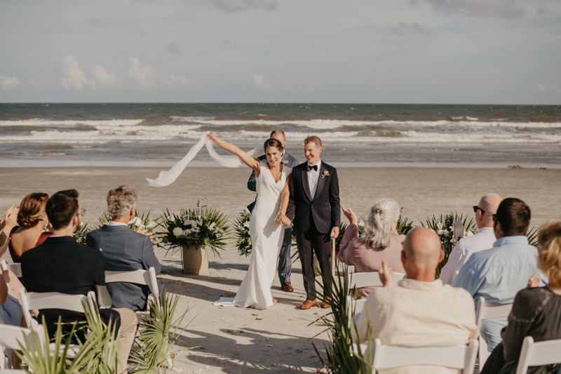 A beautiful beach wedding ceremony in Folly Beach, South Carolina by Britney Clause Photography