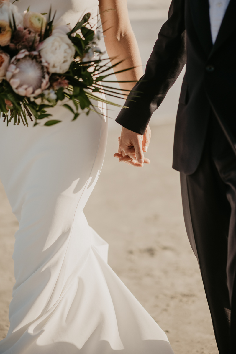 Stunning bride and groom beach wedding portraits in Folly Beach, South Carolina by Britney Clause Photography