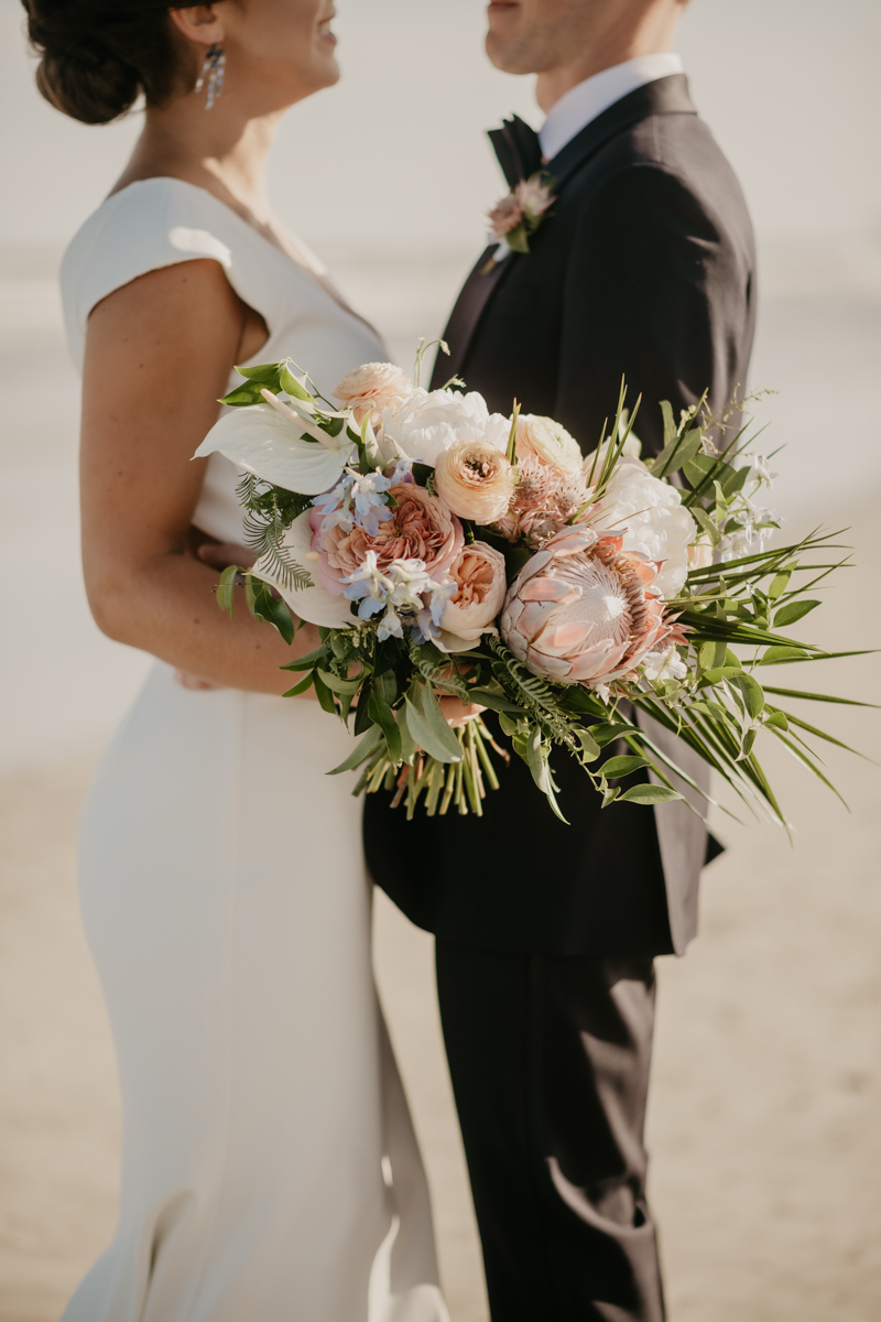 Stunning bride and groom beach wedding portraits in Folly Beach, South Carolina by Britney Clause Photography