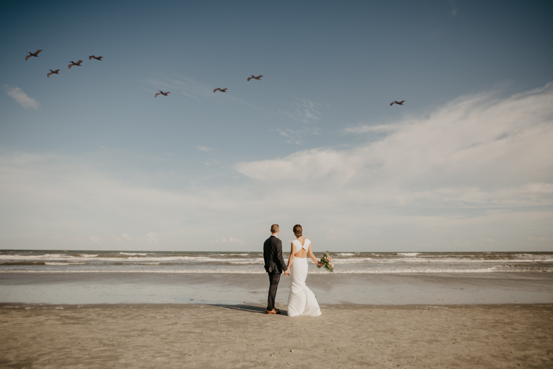 Stunning bride and groom beach wedding portraits in Folly Beach, South Carolina by Britney Clause Photography