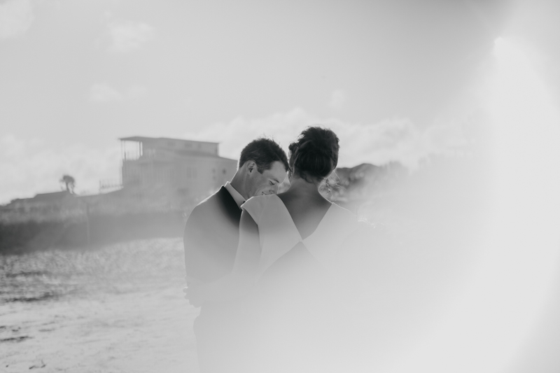 Stunning bride and groom beach wedding portraits in Folly Beach, South Carolina by Britney Clause Photography