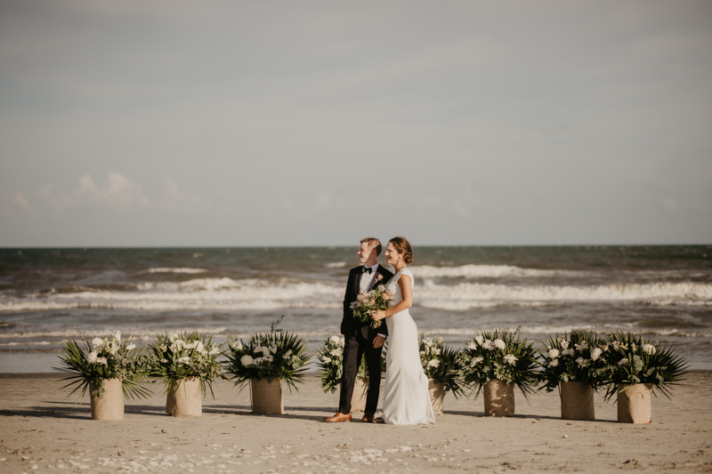 Stunning bride and groom beach wedding portraits in Folly Beach, South Carolina by Britney Clause Photography